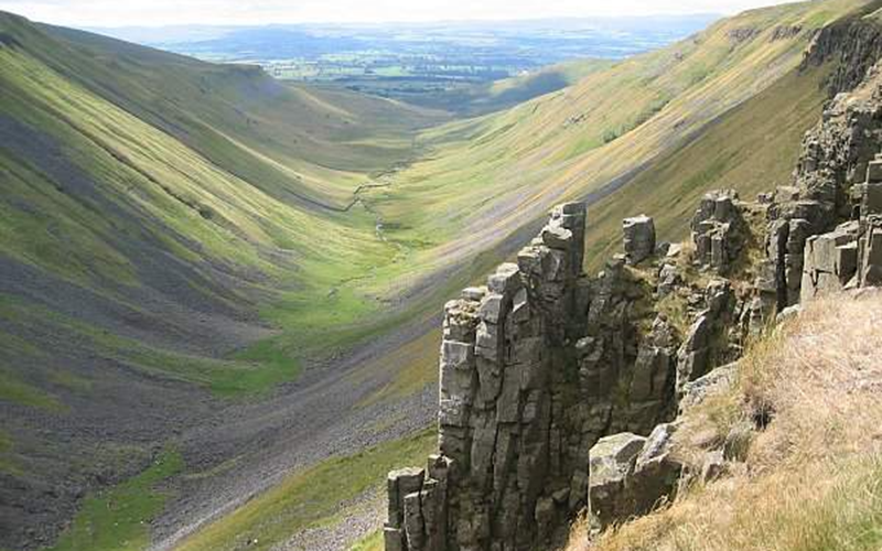 High Cup Nick is a stunning valley with rocky cliffs.